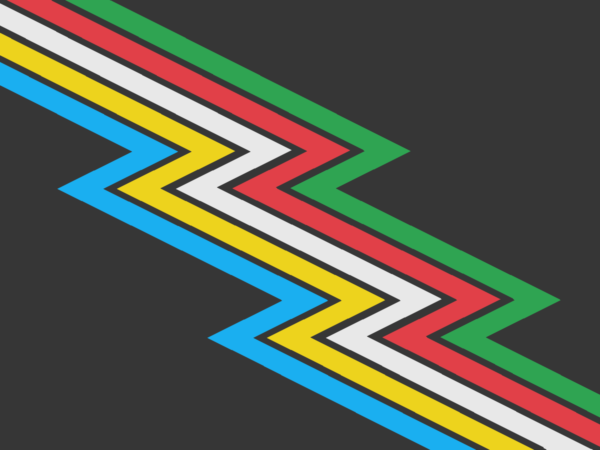 The Disability Pride flag, designed by Ann Magill. A charcoal gray/almost-black flag crossed diagonally from top-left to bottom-right by a lightning bolt band divided into parallel stripes of five colors: light blue, yellow, white, red, and green. There are narrow bands of the same gray between the colors.