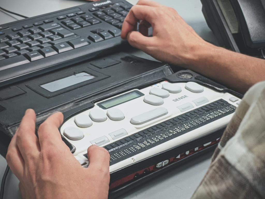 Person using a braille screen reader